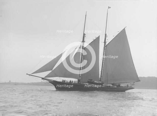 Schooner sailing, 1912. Creator: Kirk & Sons of Cowes.