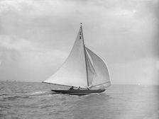 Scotia IV running downwind with spinnaker, 1913. Creator: Kirk & Sons of Cowes