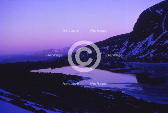 Scotland, Ross-Shire. Sunset at Loch Toll  An Lochain below An Teallach, April. Artist: CM Dixon.