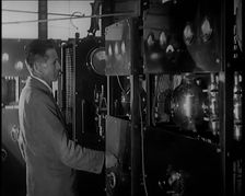 Scottish Engineer and Television Innovator John Logie Baird Testing Television Transmitting...,1920s Creator: British Pathe Ltd