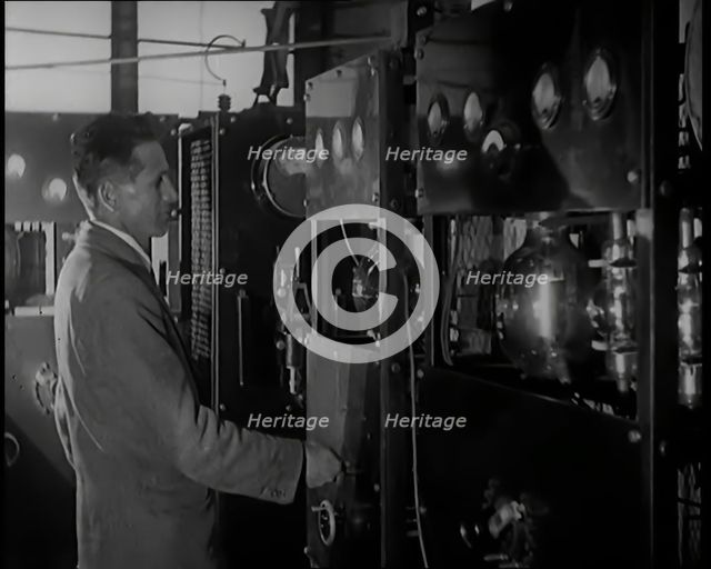 Scottish Engineer and Television Innovator John Logie Baird Testing Television Transmitting...,1920s Creator: British Pathe Ltd.