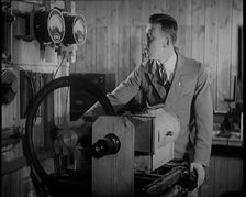 Scottish Engineer and Television Innovator John Logie Baird Testing Television Trans..., 1920s. Creator: British Pathe Ltd