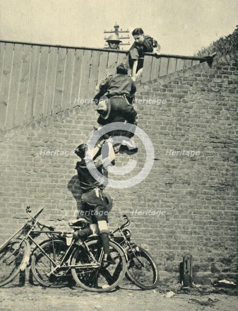 'Scouts Scaling a Wall', 1944. Creator: Unknown.