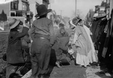 Scramble for pennies, Thanksgiving, between c1910 and c1915. Creator: Bain News Service