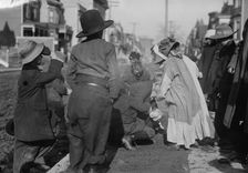 Scramble for pennies, Thanksgiving, between c1910 and c1915. Creator: Bain News Service