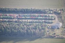 Scrap yard at John Manners Transport, Battle Bridge, Northumberland, 2015. Creator: Historic England