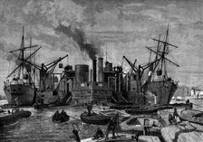 Screw colliers unloading in the Thames, 1873. Creator: Unknown