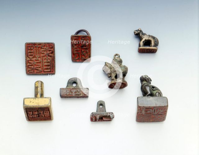 Set of 8 bronze seals, China. Creator: Unknown.