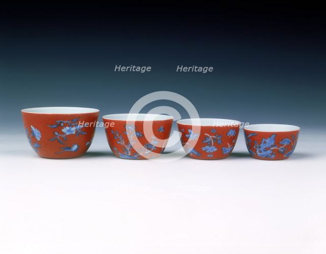 Set of four graduated wine cups on coral ground, Qing dynasty, China, 1700-1722. Artist: Unknown