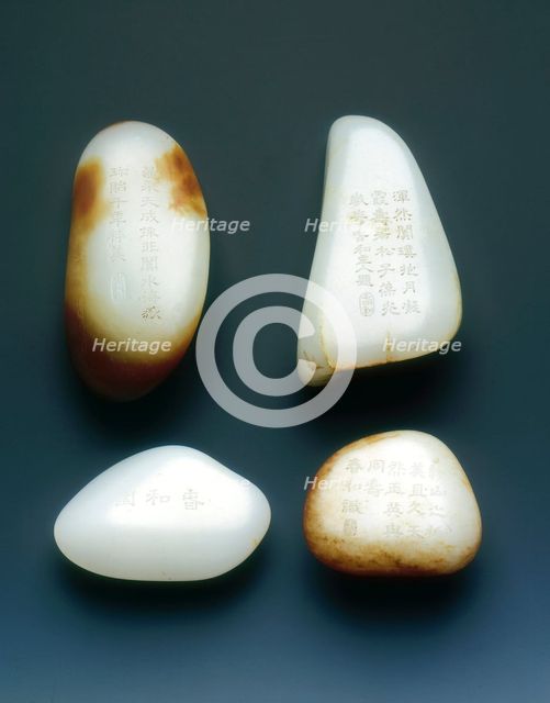 Set of four jade pebble paper weights, Qing dynasty, China, probably 18th century. Artist: Unknown