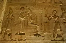Seti I offering a statue of goddess Maat to gods Osiris..., Temple of Seti I, Abydos, Egypt (2003). Creator: LTL