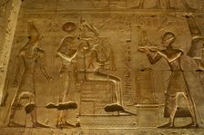 Seti I offering a statue of goddess Maat to gods Osiris..., Temple of Seti I, Abydos, Egypt (2003). Creator: LTL