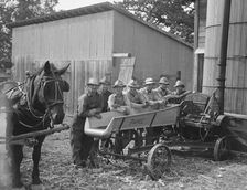 Seven of the eight farmers shown with their cooperatively owned...Yamhill County, Oregon, 1939. Creator: Dorothea Lange