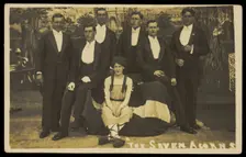 Seven men on stage set of "The seven acorns", [between 1918 and 1920?]. Creator: Unknown