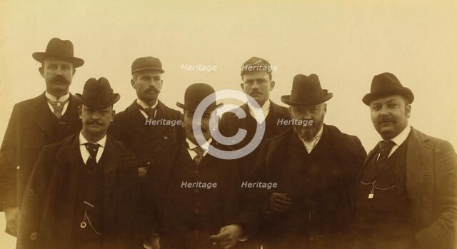 Seven men, half-length portrait, facing front,1894 or 1895. Creator: Alfred Lee Broadbent.