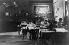 Seven women working in Roycroft shop, E. Aurora, N.Y., 1900. Creator: Frances Benjamin Johnston