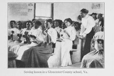 Sewing lesson in a Gloucester County school, Va., 1915. Creator: Unknown