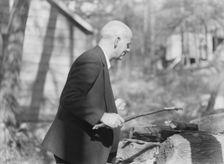 Sexton, Mr., standing outdoors, between 1932 and 1936. Creator: Arnold Genthe
