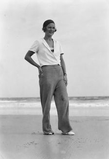 Sexton, Mrs., at the beach, 1932 July 10. Creator: Arnold Genthe