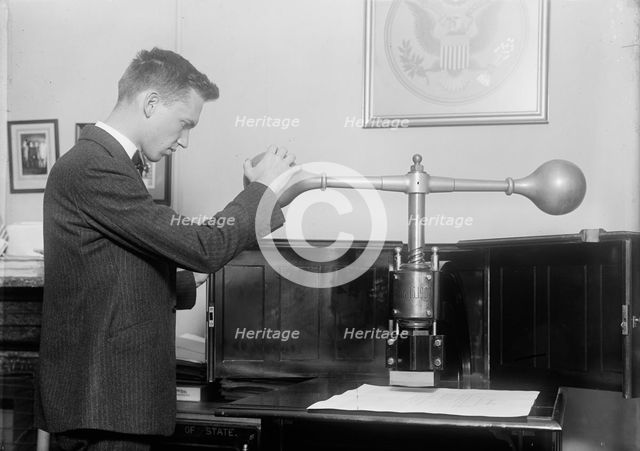 Seal of The United States at State Department, 1917. Creator: Harris & Ewing.