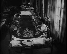 Seamstresses Sewing the Embroidery on the Coronation Mantle of King George VI, 1937. Creator: British Pathe Ltd