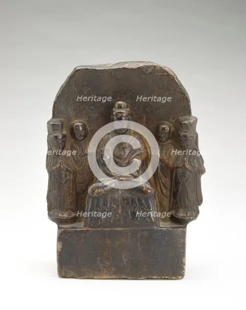 Seated Buddha (Shakyamuni) with standing monks and bodhisattvas..., Period of Division, 535. Creator: Unknown.
