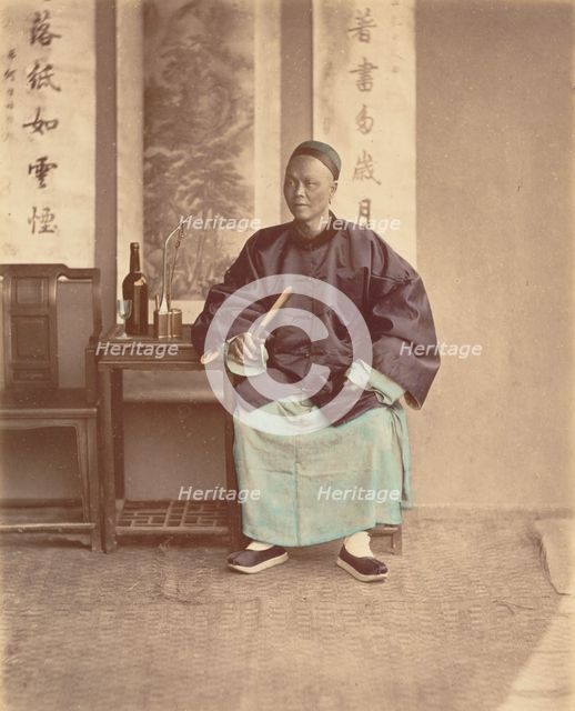 [Seated Chinese Woman with Fan], 1870s. Creator: Baron Raimund von Stillfried.