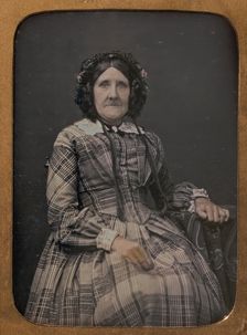 Seated Elderly Woman Wearing Plaid Dress and Bonnet, 1854-60. Creator: William Hardy Kent