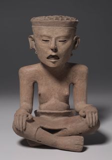 Seated Figure Wearing a Skin, 600-1000. Creator: Unknown