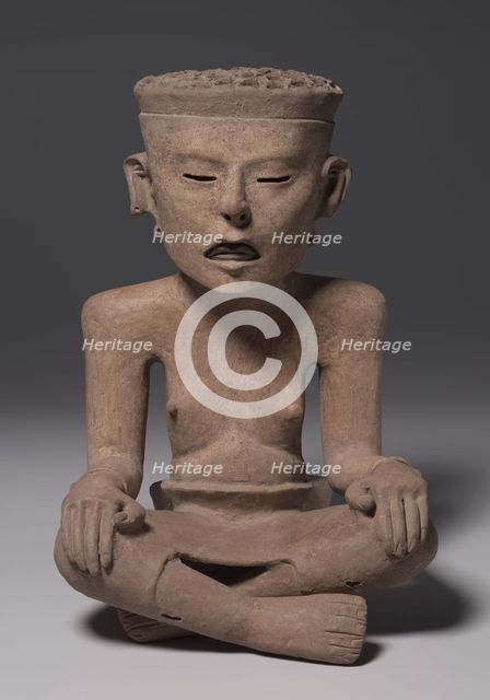 Seated Figure Wearing a Skin, 600-1000. Creator: Unknown.