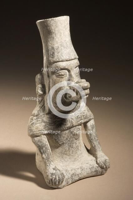 Seated Figure Wearing Serpent Mask, A.D. 550-900. Creator: Unknown.