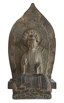 Seated figure of the Buddha Sakyamuni in high relief, Period of Division, 534-550. Creator: Unknown
