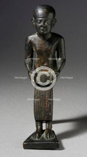 Seated Figure of the God Imhotep Holding a Scroll, 712-332 B.C. or later. Creator: Unknown.