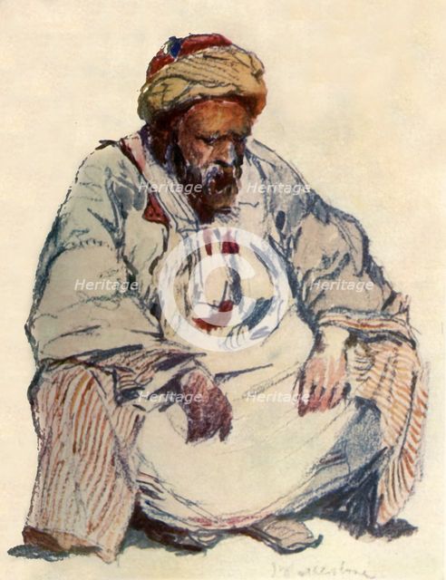 'Seated Figure of Syrian Shepherd in Sheepskin Coat', 1902. Creator: John Fulleylove.