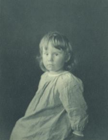 Seated girl with body facing left looking at the camera, c1900. Creator: Myra Albert Wiggins