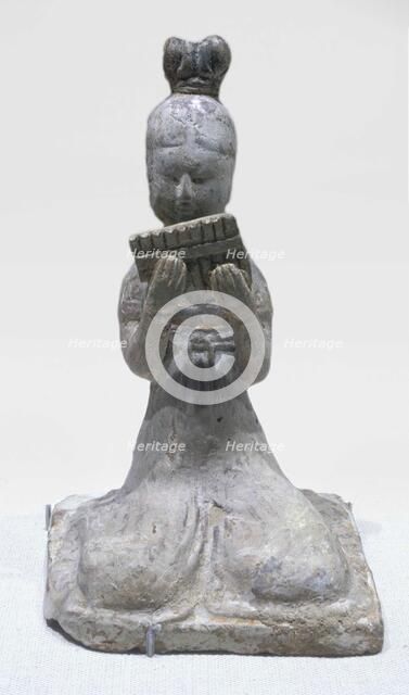 Seated pan-pipe player, about 650. Creator: Unknown.