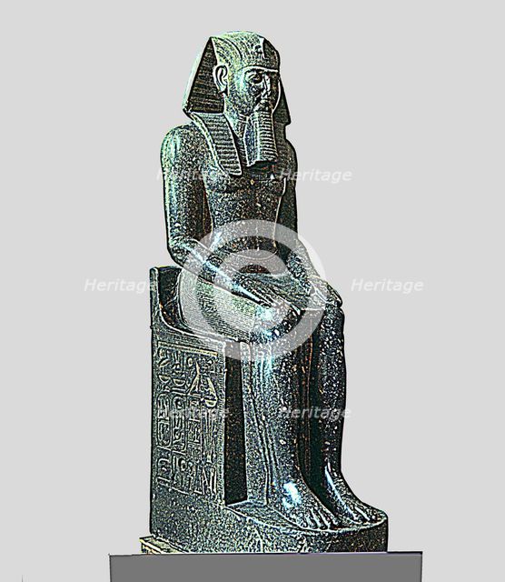 Seated statue of Ramses II, made in diorite, side view, it comes from Tanis.