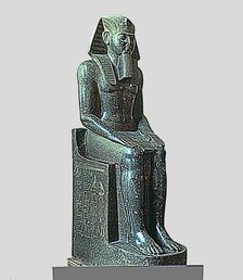 Seated statue of Ramses II, made in diorite, side view, it comes from Tanis