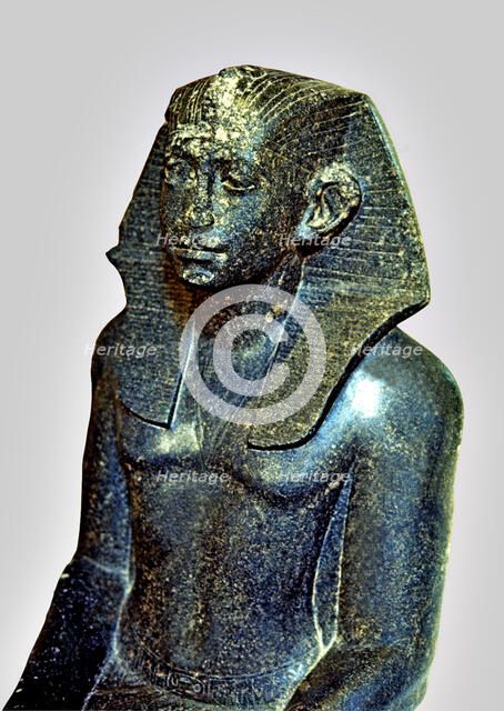 Seated statue of Sesostris III depicted as a young man, made in diorite, detail of the top, comes…
