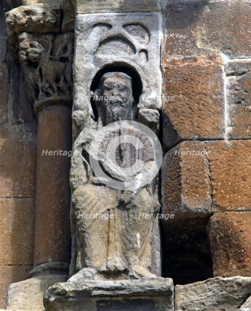 Seated statue on the façade of the church of Santo Domingo de Soria, supposedly the king Alfonso …