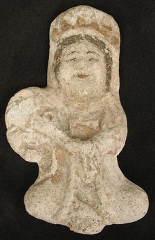 Seated tambourine player, Iran, 12th century. Creator: Unknown