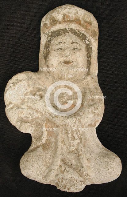 Seated tambourine player, Iran, 12th century. Creator: Unknown.