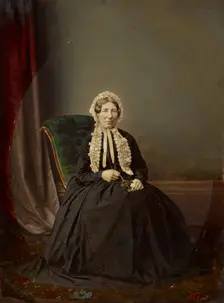 Seated woman in bonnet, about 1850. Creator: Unknown