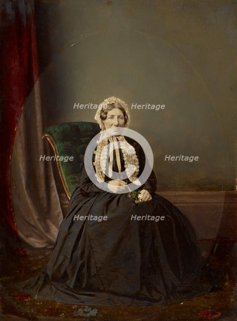 Seated woman in bonnet, about 1850. Creator: Unknown.