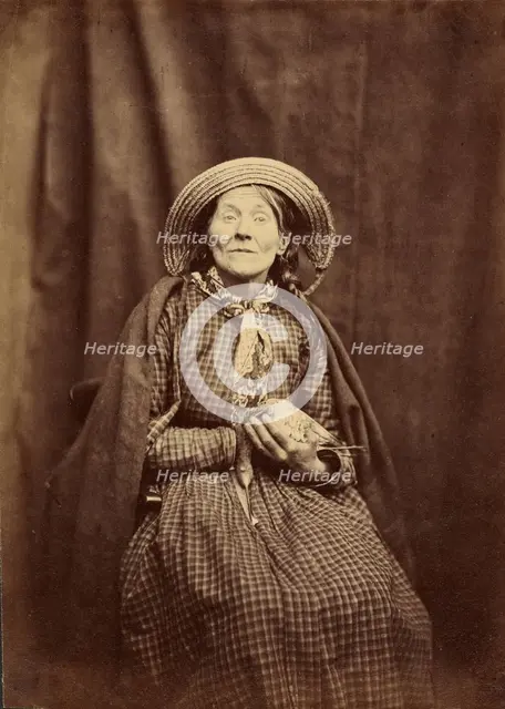 Seated Woman with a Bird, about 1855. Creator: Hugh Welch Diamond.