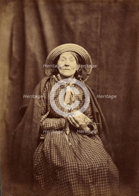 Seated Woman with a Bird, about 1855. Creator: Hugh Welch Diamond.