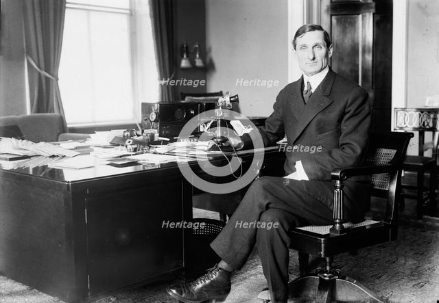 Sec'y. McAdoo at desk, 1913. Creator: Bain News Service.