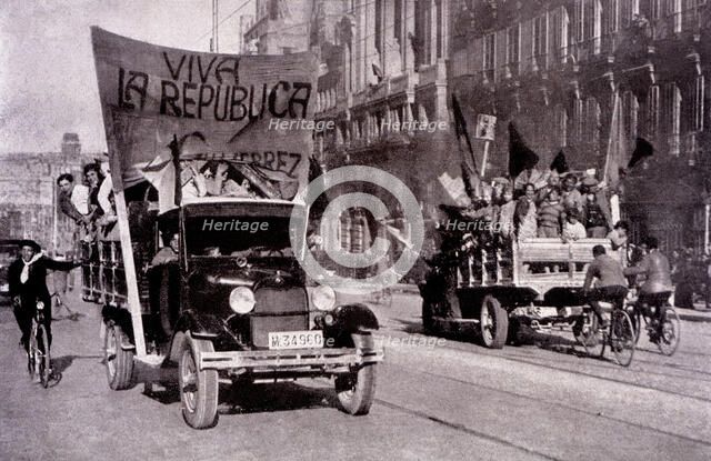Second Republic, scene of the streets of Madrid with vehicles serving the Republican propaganda, …