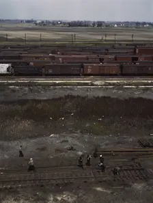 Section crew at work on the track, C. M. St. P. & P. R.R., Bensenville, Ill., 1943. Creator: Jack Delano