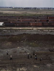 Section crew at work on the track, C. M. St. P. & P. R.R., Bensenville, Ill., 1943. Creator: Jack Delano